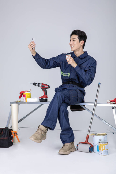 millennials and gen z, korean asian young man, site staff on a video call with coffee - Fotografie, Obrázek