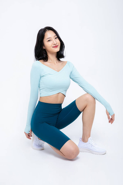 healthy beauty concept photo of korean asian beautiful woman sitting and posing - Фото, изображение