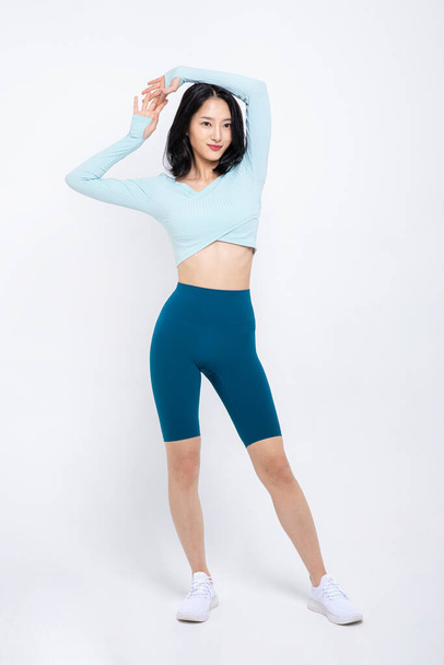 healthy beauty concept photo of korean asian beautiful woman stretching - 写真・画像