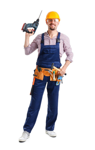 Construtor masculino com broca em fundo branco - Foto, Imagem