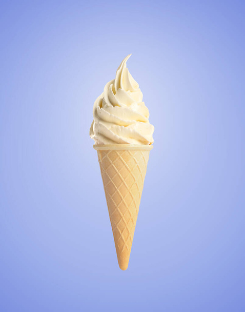 Tasty vanilla ice cream in waffle cone on pastel blue background. Soft serve - Foto, Imagen