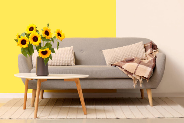 Vase with sunflowers on table in living room - Photo, Image
