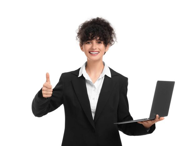 Beautiful happy businesswoman with laptop showing thumbs up on white background - Foto, immagini