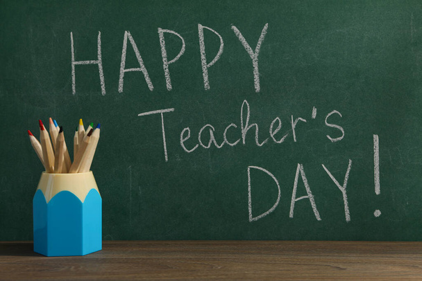 Happy teacher's day greetings, inscription on a green board - Valokuva, kuva