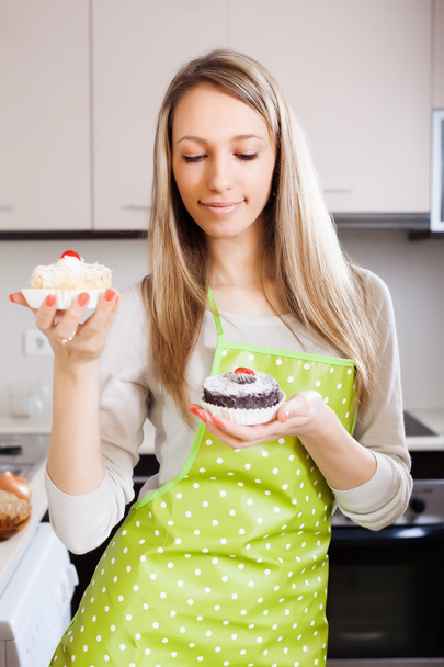 Blonde girl with cakes  - 写真・画像