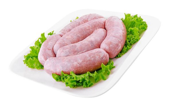 Fresh raw pork bratwurst isolated on a white background - Фото, изображение