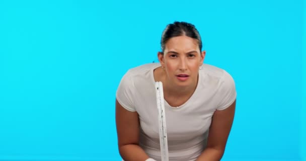 Face, tennis and serious woman with racket for fitness in studio isolated on a blue background mockup. Portrait, racquet sports and athlete from Brazil ready to start exercise, training or workout - Footage, Video