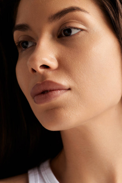 Closeup portrait of young woman representing beauty industry and clean skin - Photo, Image