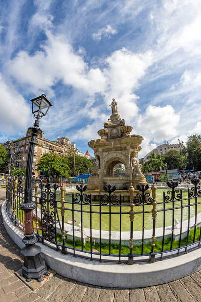 Flora Fountain and Oriental Old Buildings at blue sky - Photo, Image