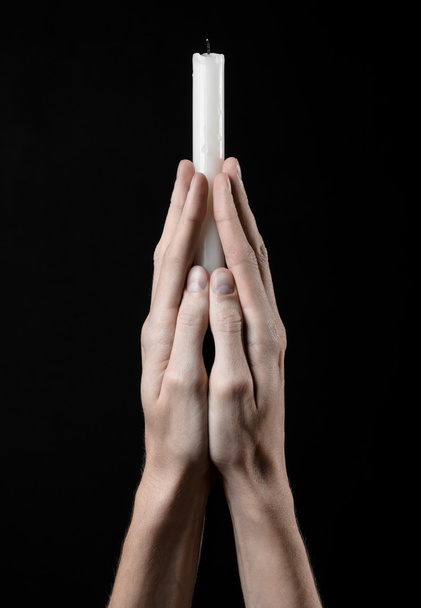 hands holding a candle, a candle is lit, black background, solitude, warmth, in the dark, Hands death, hands witch - Photo, Image