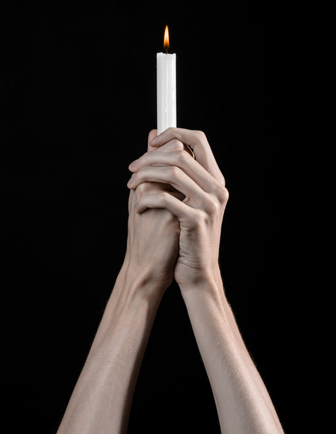 hands holding a candle, a candle is lit, black background, solitude, warmth, in the dark, Hands death, hands witch - Фото, зображення