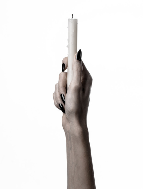 hands holding a candle, a candle is lit, white background, solitude, warmth, in the dark, Hands death, hands witch - Foto, immagini