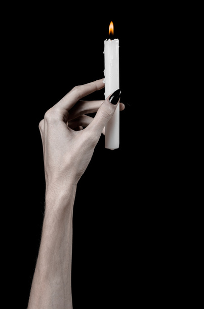 hands holding a candle, a candle is lit, black background, solitude, warmth, in the dark, Hands death, hands witch - Fotó, kép