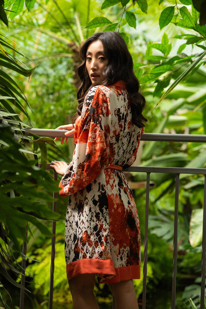 beautiful young woman in a tropical jungle - Fotó, kép