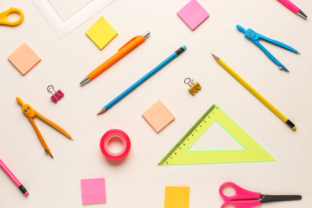 Composition with different stationery on light background - Fotoğraf, Görsel