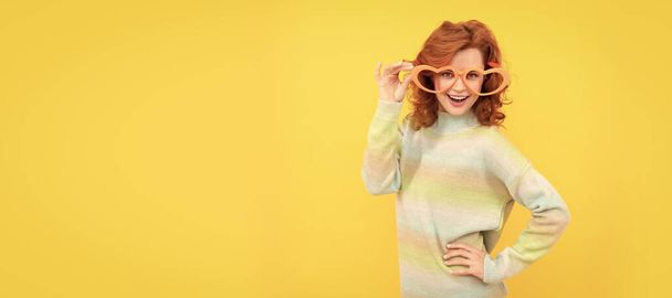 posing for photo. positive emotions. cheerful lady on yellow background. funny redhead woman. Woman isolated face portrait, banner with copy space - Фото, зображення