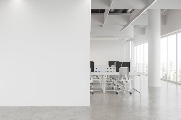 White workspace interior with chairs and pc monitors on desk, column and concrete floor. Minimalist coworking space with panoramic window on Kuala Lumpur. Mockup empty wall partition. 3D rendering - Foto, Imagem