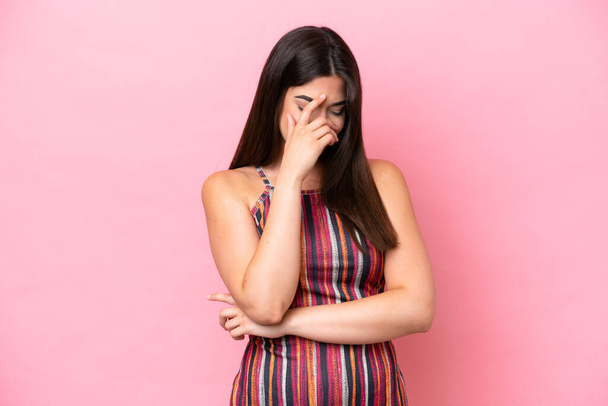 Young Brazilian woman isolated on pink background laughing - Fotografie, Obrázek
