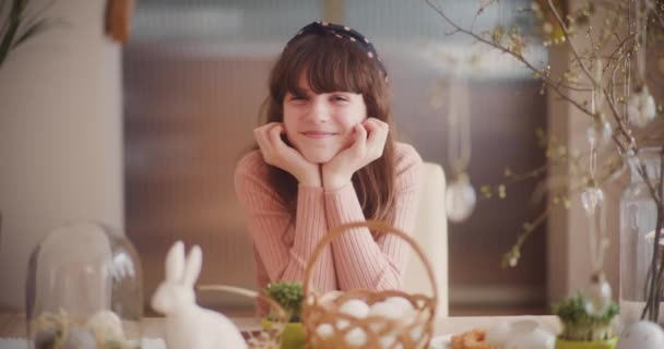 Vibrant and joyful young girl embraces the spirit of Easter holidays in a captivating portrait - Footage, Video