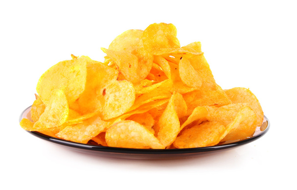 Potato crisps on the plate isolated on white - Foto, immagini
