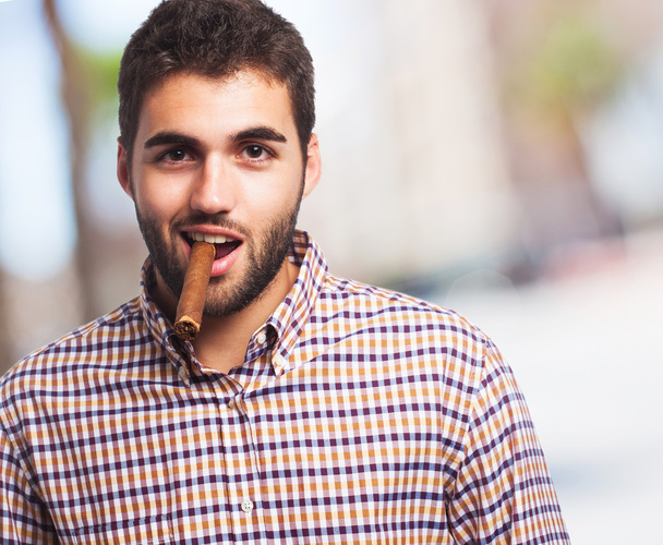 Handsome man smoking cigar - Photo, Image