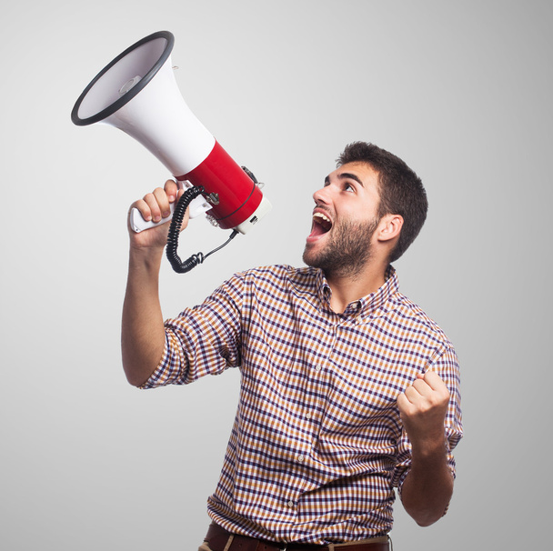 Man shouting with  megaphone - Фото, изображение