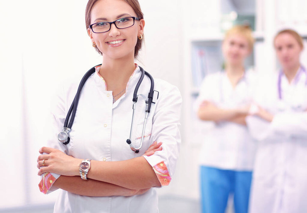 Portrait of woman doctor standing at hospital. - Foto, Imagen