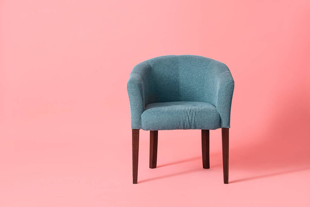Soft armchair on pink background - Foto, imagen