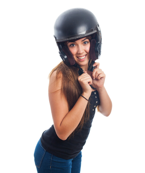 Young woman with a black helmet - Foto, immagini