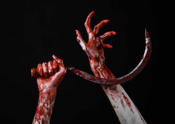 bloody hand holding a sickle, sickle bloody, bloody scythe, bloody theme, halloween theme, black background, isolated, killer, psycho, thug, a bloody knife, bloody hands of zombies, cutthroat - Zdjęcie, obraz