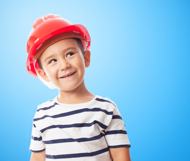 Boy wearing a mason helmet - Фото, изображение