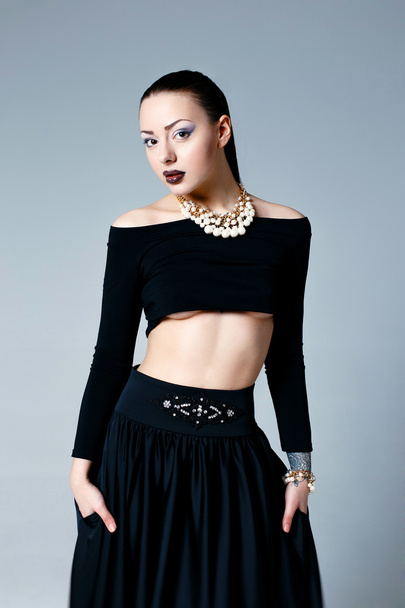 Female model in black clothes - Фото, зображення