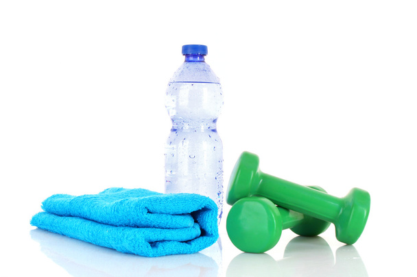 Blue bottle of water, sports towel and exercise equipment isola - Foto, afbeelding