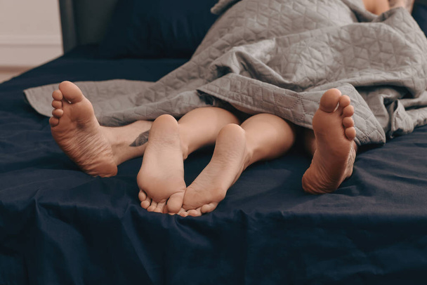 Passionate couple having sex on bed, closeup - Φωτογραφία, εικόνα