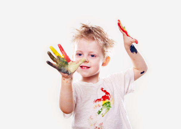 The baby boy with  gouache soiled hands and shirt isolated - Fotografie, Obrázek