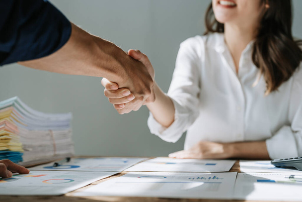 Handshake, contract deal and business partnership of meeting with shaking hands. Networking, hiring and professional negotiation of onboarding collaboration and congratulations of project. - Photo, Image
