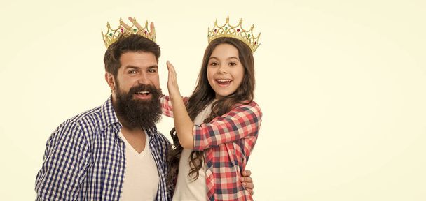 Royal family. Man golden crown and little girl kid. King and princess. Happy family white background. Bearded man proud of his daughter. Play game with daughter. Fatherhood concept. Fun with daughter. - Foto, afbeelding