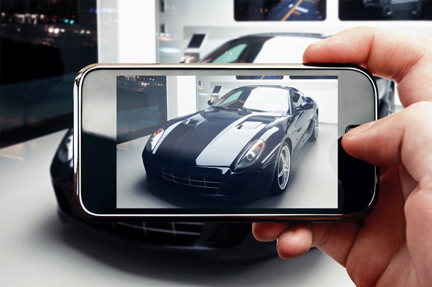 Smart phone mobile photo in car showroom - Photo, image