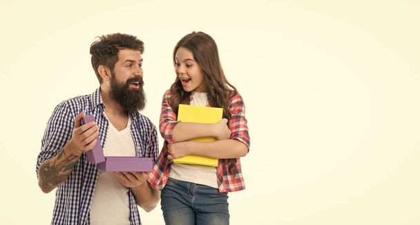The true meaning of Boxing day. Happy father and little daughter holding gift boxes on Boxing day afternoon. Bearded man and small child celebrating Boxing day. Wishing a happy Boxing day. - Фото, изображение