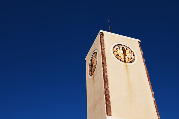 Ρουστίκ πύργο του ρολογιού στην Οία. Σαντορίνη, Ελλάδα. - Φωτογραφία, εικόνα