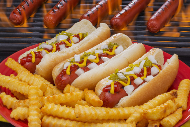 Három finom Hot dogot, hasábburgonyával - Fotó, kép