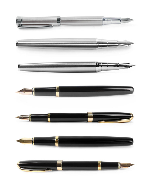 Set of fountain pens on white background, top view - Photo, Image