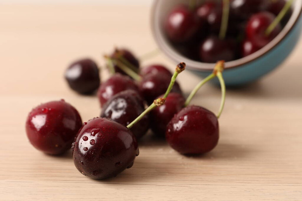 fresh cherries in a wooden bowl - Photo, image