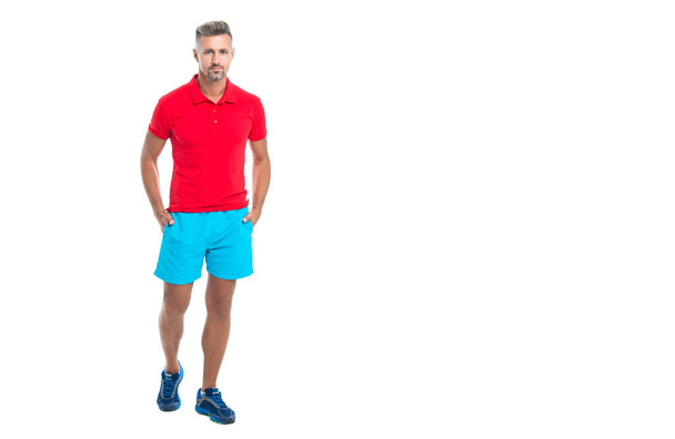 sportsman has break after working, banner. sporty sportsman in sport clothes isolated on white. Sportsman wear sports uniform and looking at camera. athletic sportsman in working out over studio. - Valokuva, kuva