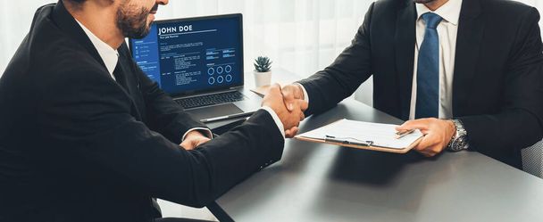 Successful job interview at business office with handshake. Positive discussion of qualifications and application for position. Job hiring concept between candidate and interviewer. Fervent - Foto, imagen