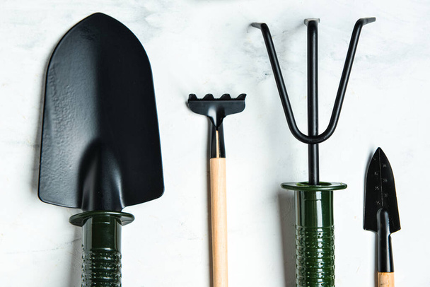 Set of gardening tools on white marble background - 写真・画像