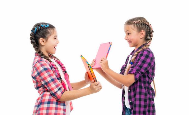 back to school. school children with book. School children and their books. education in high school. girls children holding book homework. funny fight. - Photo, Image