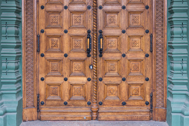 close-up image of an wooden ancient doors - Fotó, kép