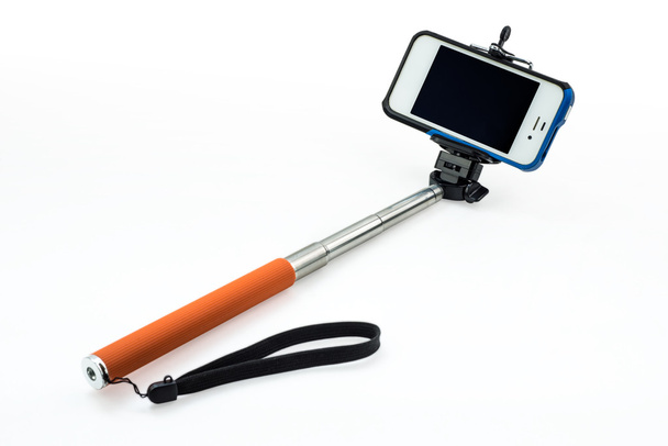 白い背景に調節可能なクランプ selfie スティック - 写真・画像