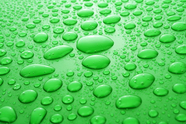 Green water drops background - Foto, Imagen